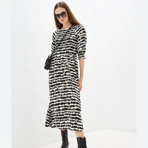 B.young black and white dress